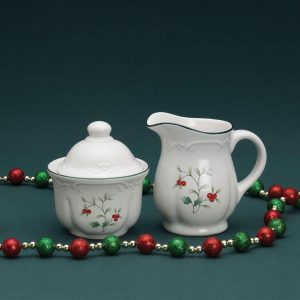 The Pfaltzgraff Winterberry Sugar and Creamer Set is the holiday classic that brings this timeless holly and berry motif in elegantly sculpted dinnerware.